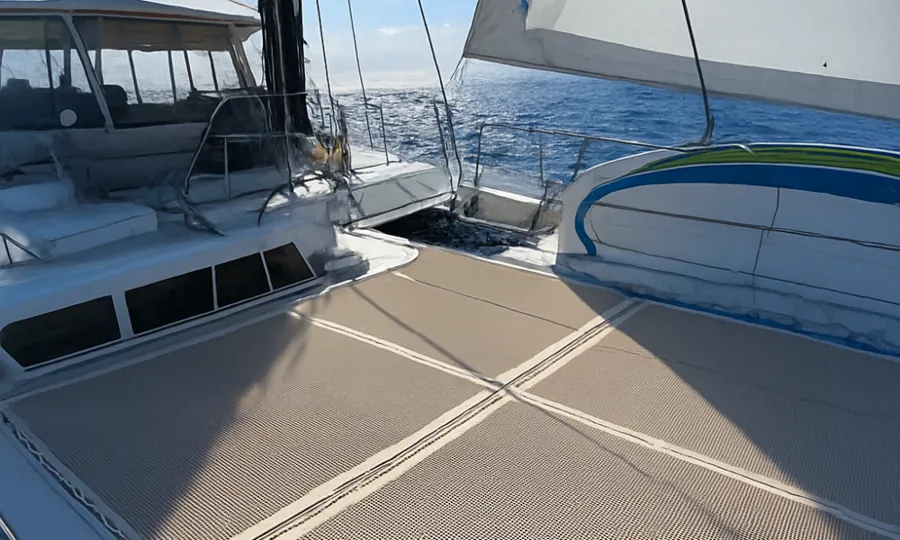 Deck and sails of a catamaran on the Atlantic off Lanzarote