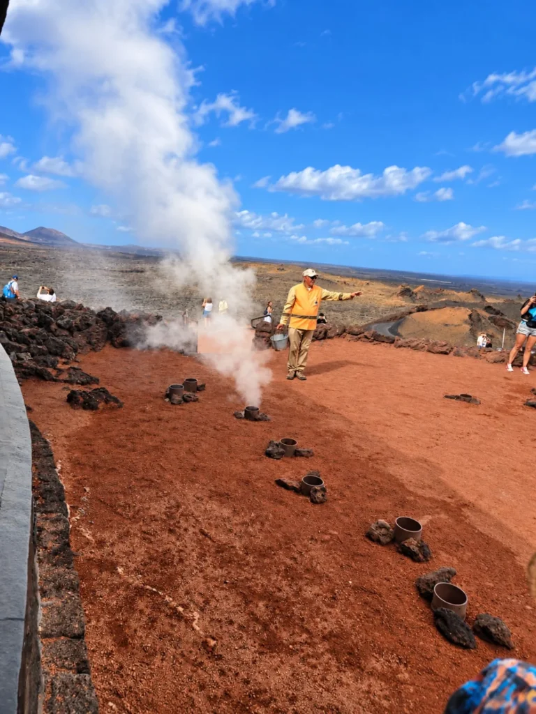Steam rising during a geothermal demonstration at Timanfaya National Park, Lanzarote